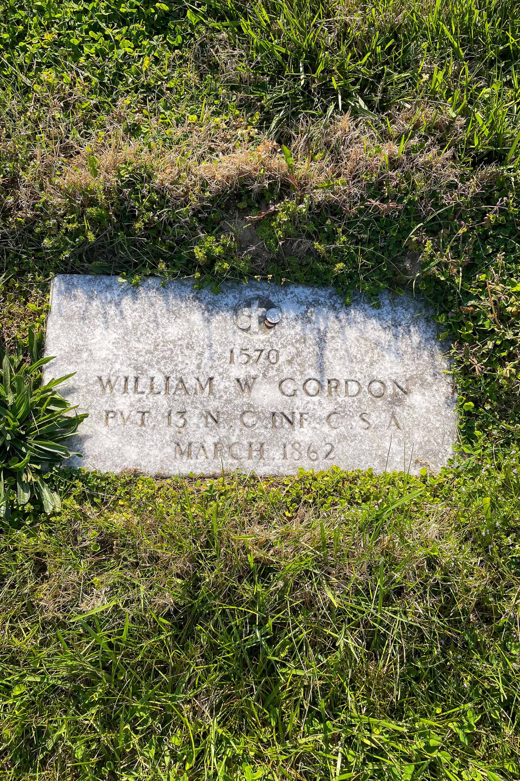 Coins on Tombstones Where The Dogwood Blooms